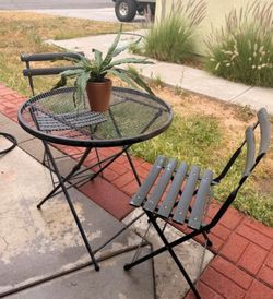 Patio set, The table and chairs fold up.