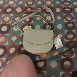 Micheal Kors Small Size Beige Colored