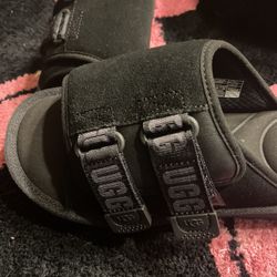 Brand new UGGs men slides a size 7