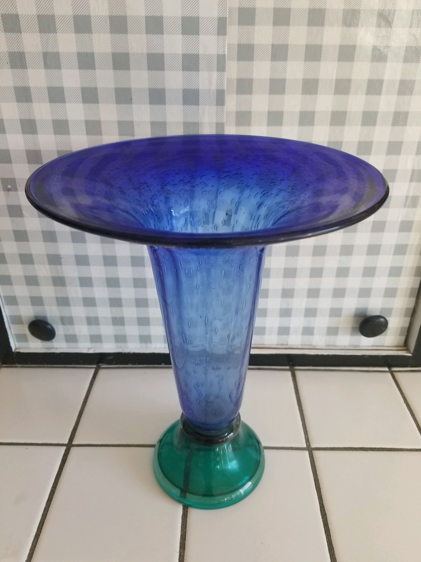 Beautiful blue and green glass vase. 10" tall x 8" wide at top.