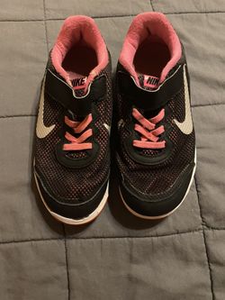Girls Nike Shoes Size 13c  pink and black  Well loved but still a lot of wear left in them 