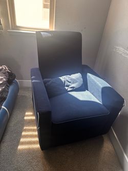 Navy blue upholstered recliner chair