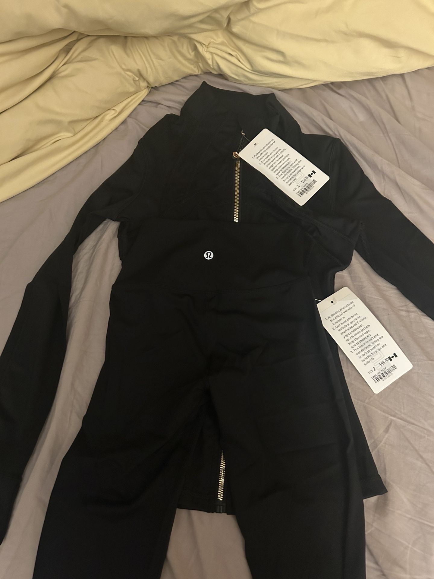 Brand new Black/Gold Define Cropped Jacket Nulu with Legging Lulu Set Size 2