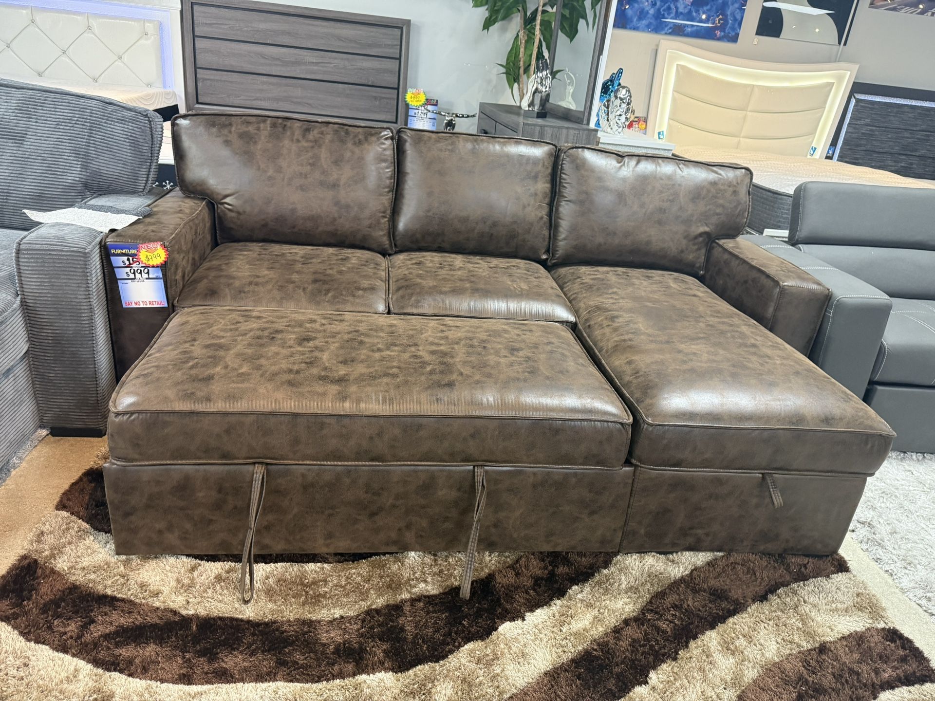 Brown Pull Out Sleeper Sectional With Drop Down Console And Storage Chaise Only $599