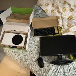 Xbox s keyboard and mouse desk and monitor plus a ps3
