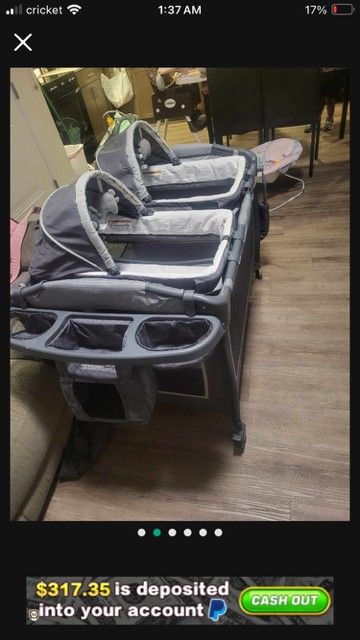 Twin Playpen And Bassinet.\nWith changing table