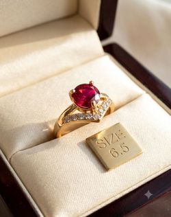 Beautiful red gemstone and CZ diamond ring size6.5