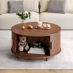 Round Coffee Table with Storage, 31.5" Modern Coffee Table with 360° Curved Sliding Door, Fluted Wood Accent Coffee Table with Adjustable Footpads, Ro