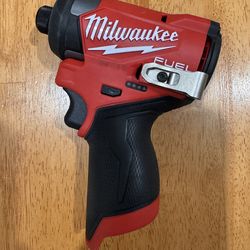 Milwaukee m12 fuel impact driver 1/4 drill took brand nee