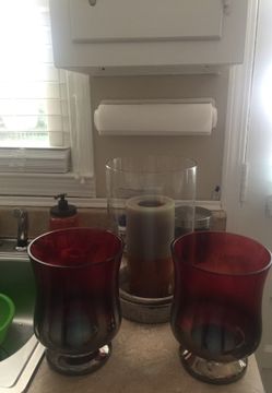 Three candle holders must pick up in south end.