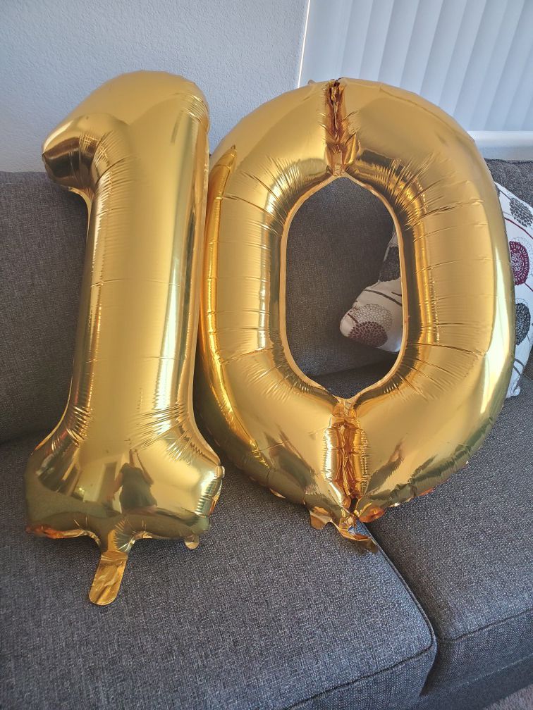 Number 10 gold balloons.