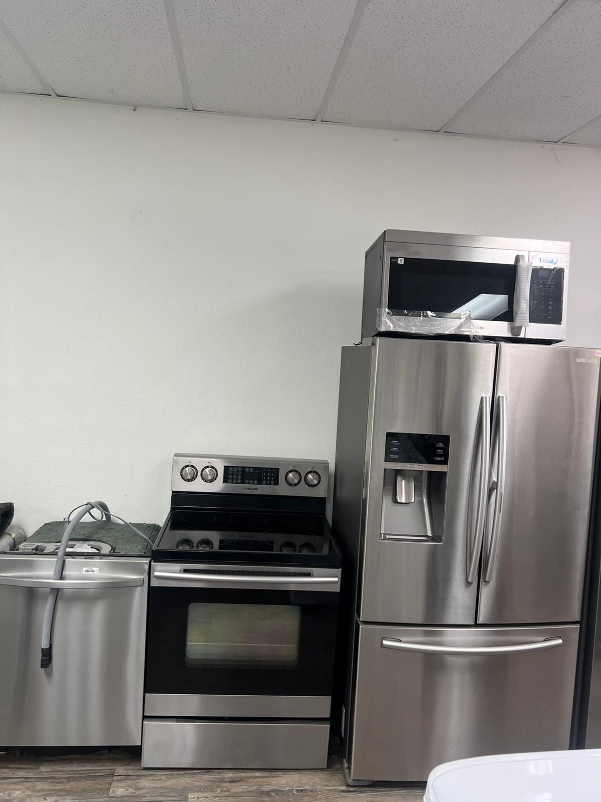 Combo Kitchen package Samsung 4 pcs Good Condition working perfect with warranty delivery available Stainless steel  New Dishwasher and New Microwave