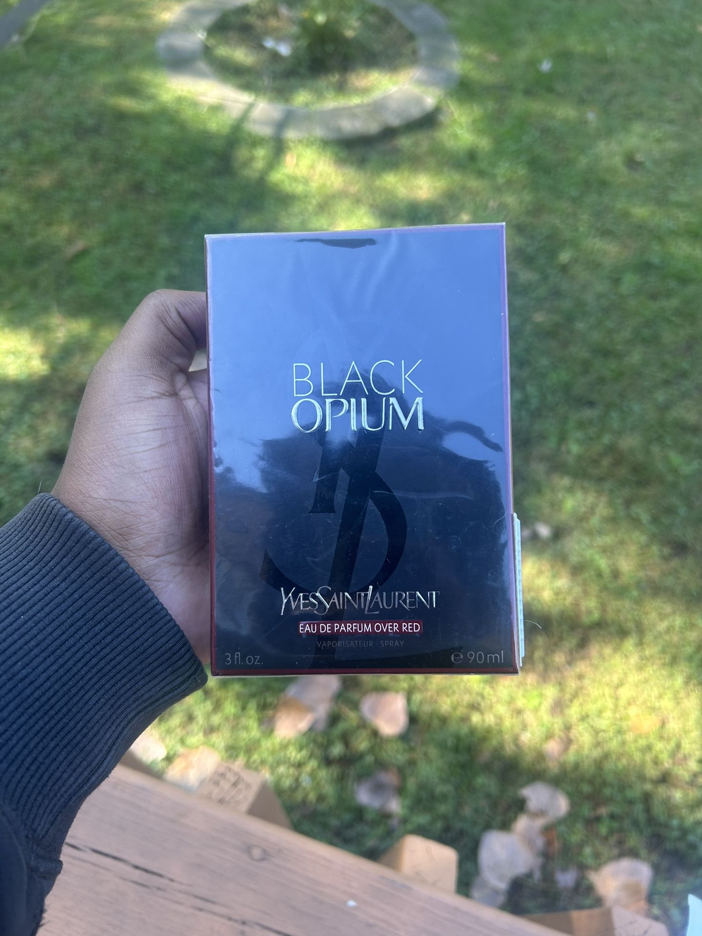 Ysl Black Opium Eau De Parfum Over Red