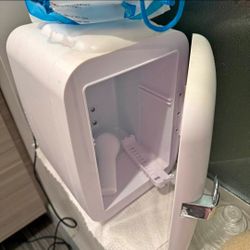 White skincare mini fridge