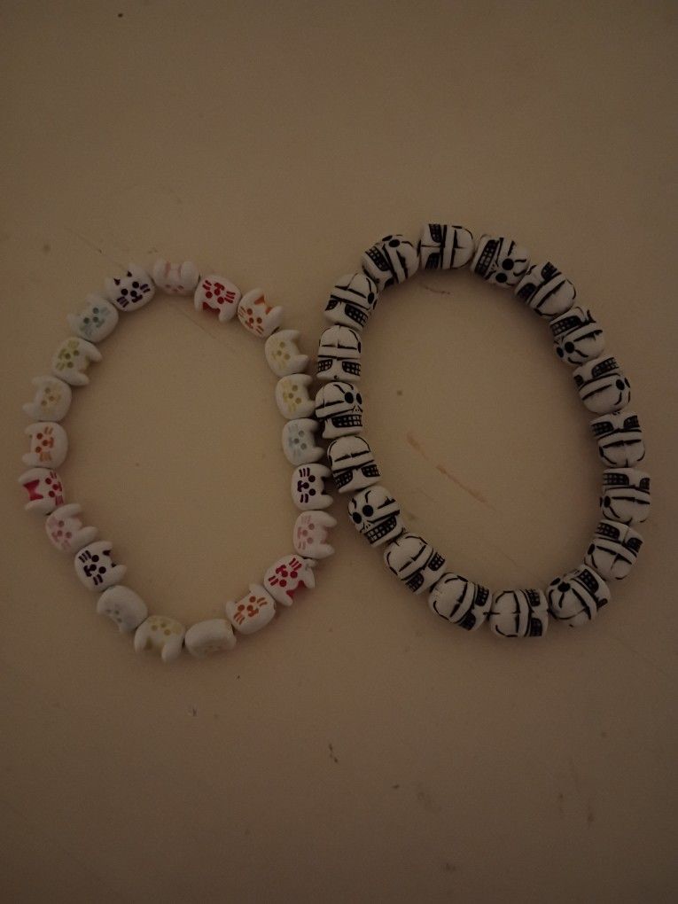 2 Plastic Beaded Bracelets