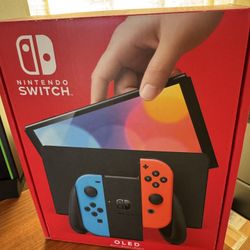Nintendo Switch OLED (New/Never used)