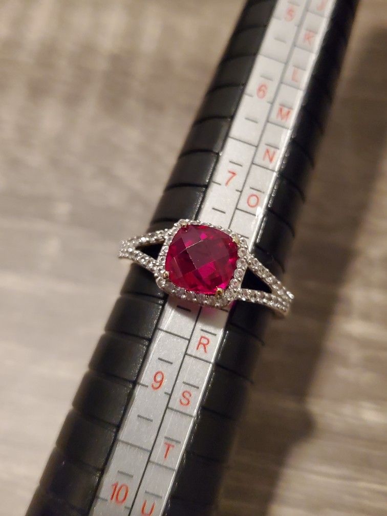 10k gold ring with red sapphire/white czs