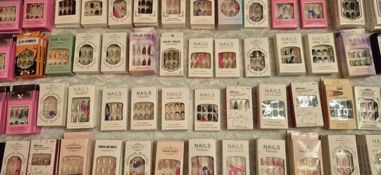 $2 each set (over 50 sets of press on nails to choose from)