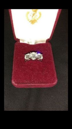 14kt white gold ring stones are CZ