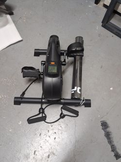 Seated pedal exerciser. Under desk pedal.