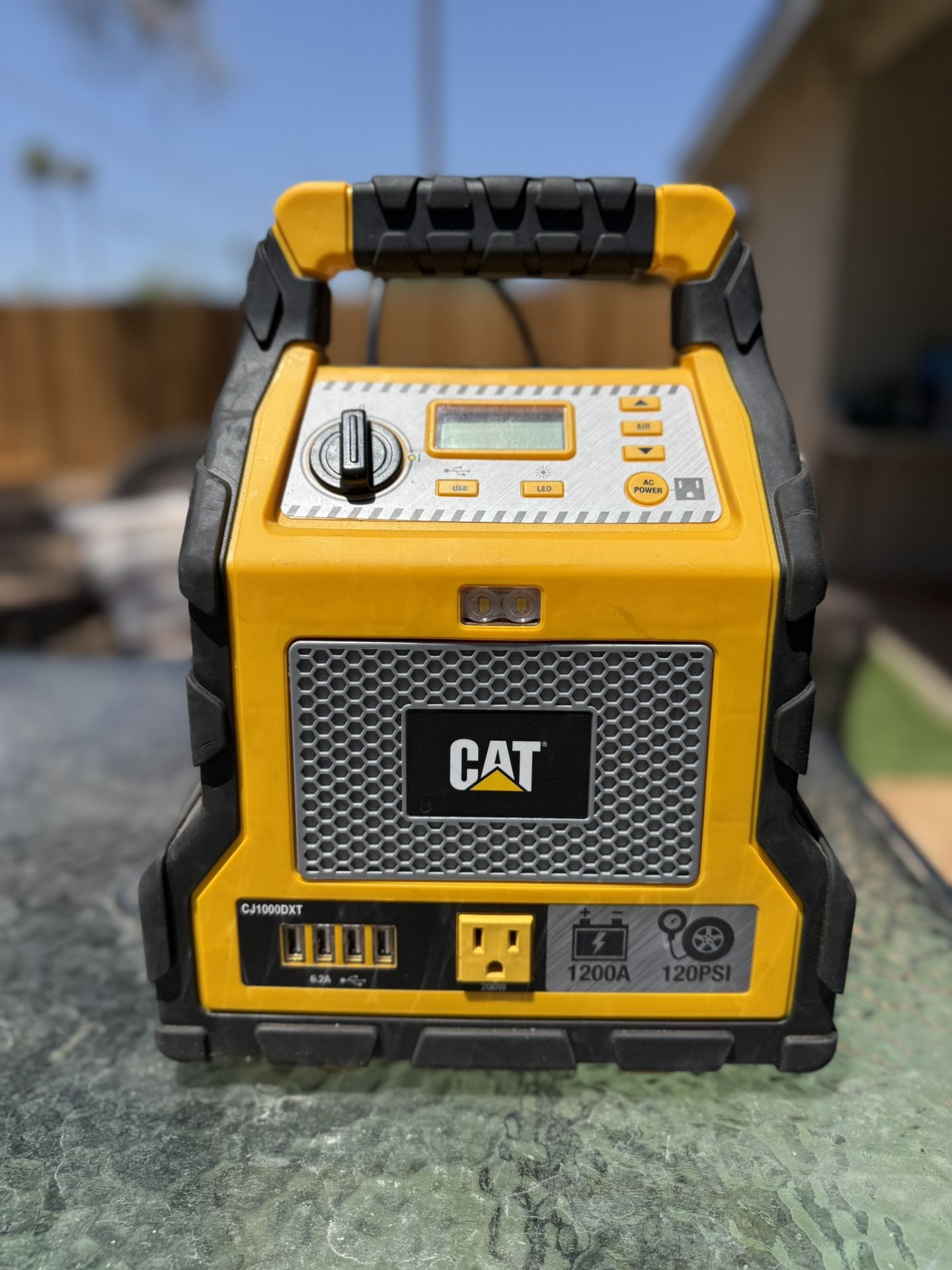 Cat Power Station with 1,200-Peak-Amp Jump Starter, Tire Compressor, and Power Inverter