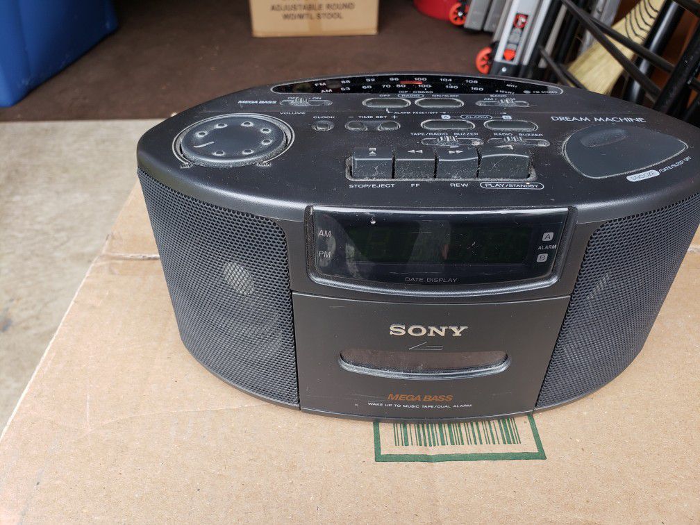 Sony alarm clock, radio ane cassette tape player.
