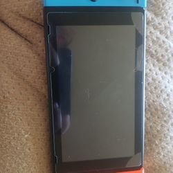Used Nintendo Switch, Cracked Screen Protector, With One Game Included