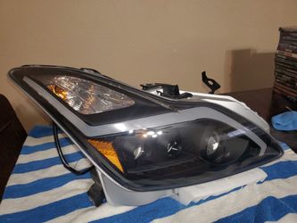 INFINITI G37 COUPE PASSANGER HEADLIGHT AFTERMARKET