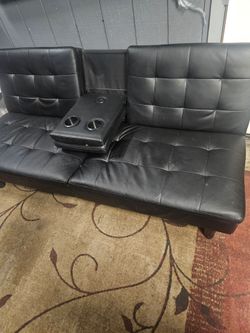 Black leather Flooton bed and sofa