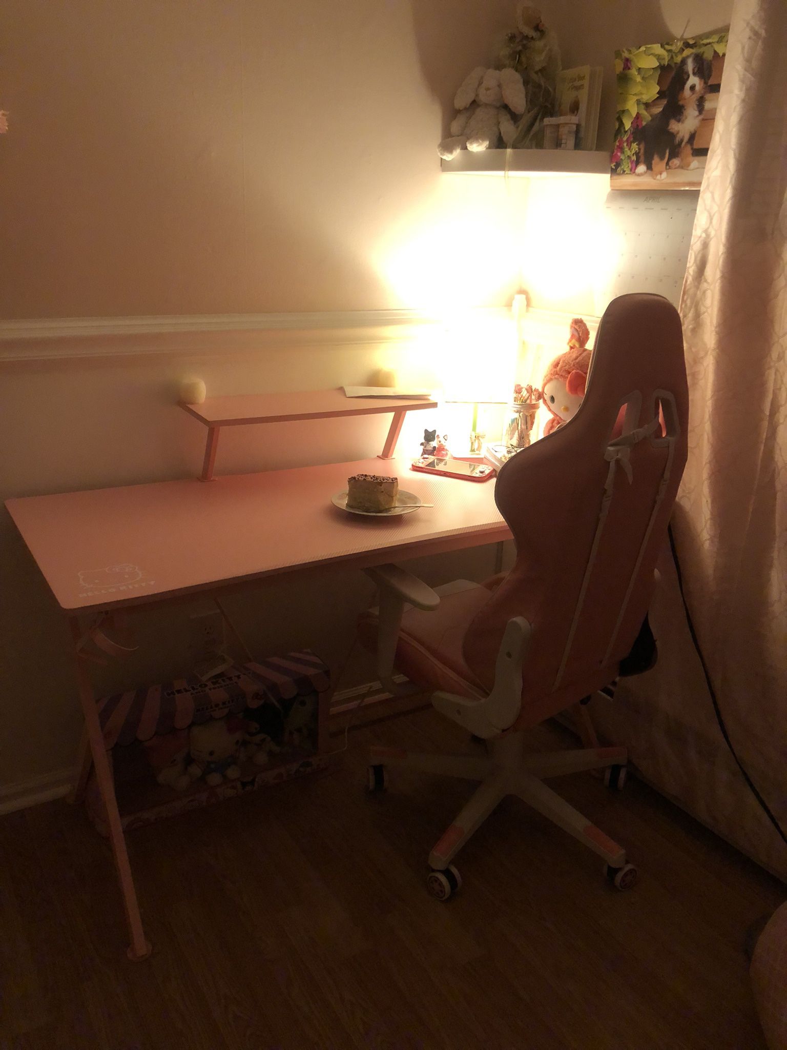 pink desk with gaming chair 