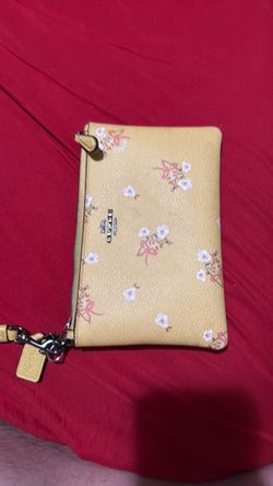 Yellow coach wristlet