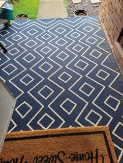 Navy blue geometric area rug