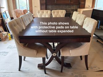 Beautiful formal dining room table with self-storing butterfly leaf + 8 matching chairs + table pads