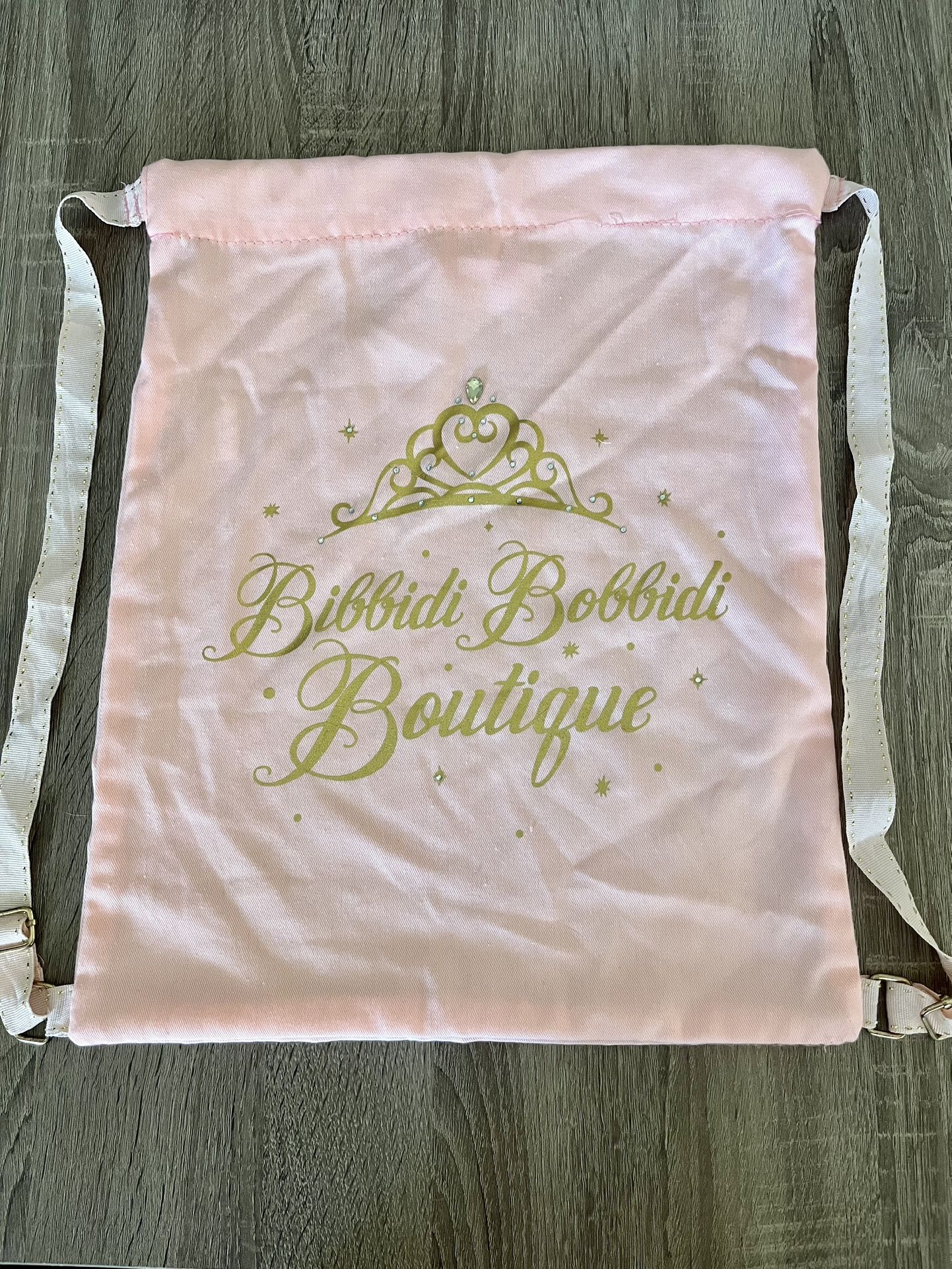 Disney Parks Bibbidi Bobbidi Boutique Pink/Peach colored soft drawstring backpack