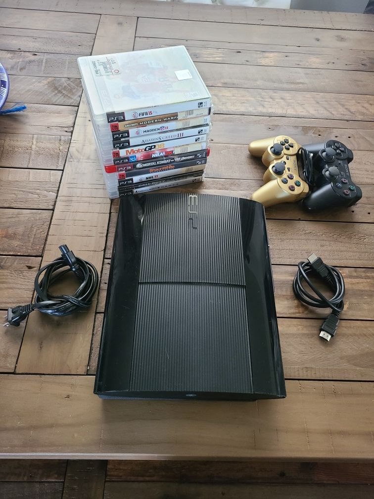 PS3 Slim with games and 2 controllers