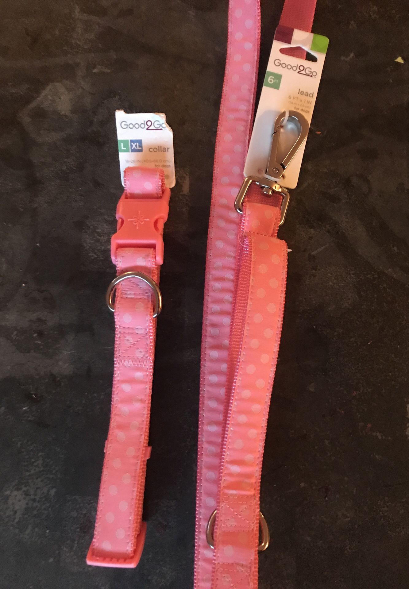 Brandnew pink dog collar with white polka dots and leash