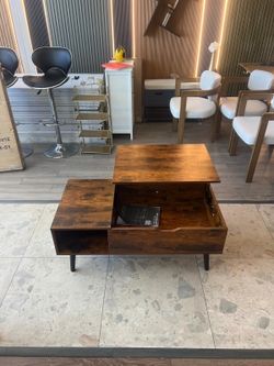 Lifted coffee table adjustable