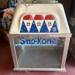 This image shows a vintage Gold Medal Sno-Kone machine, a commercial-grade for making snow cones