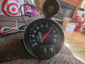 Auto Meter tachometer