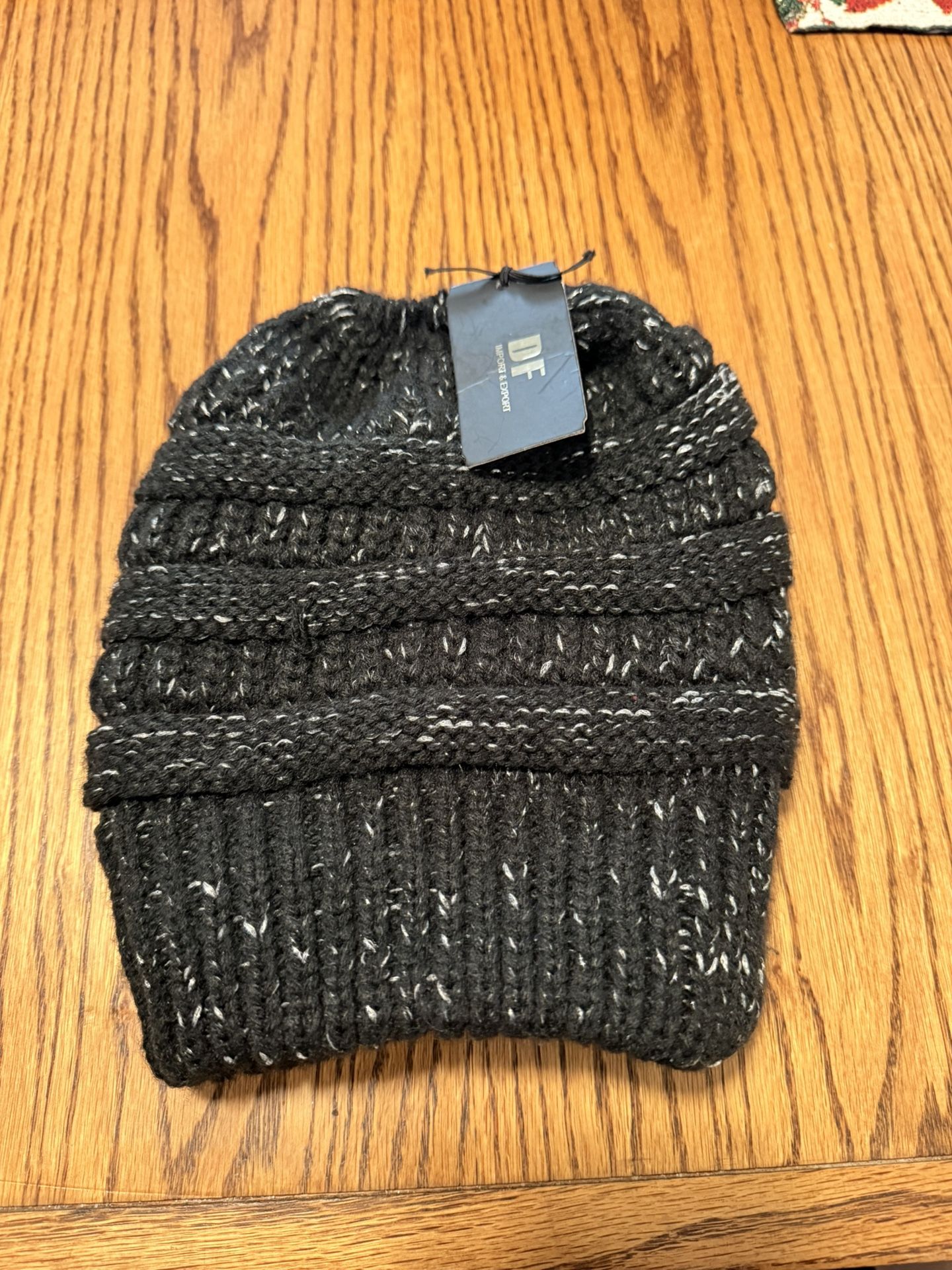 Warm dark gray hat for women.