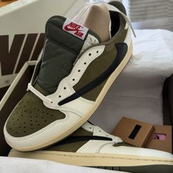  Travis Scott x Air Jordan 1 Retro Low OG SP "Reverse Olive" sneaker. 