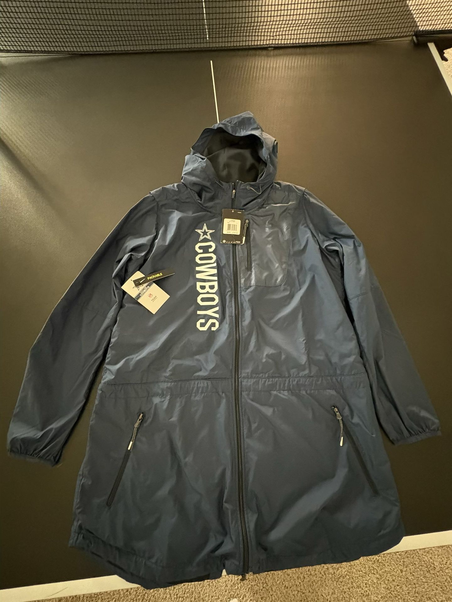 Brand new Dallas Cowboys Nike Woman’s Large Windbreaker Jacket