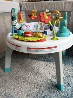 Fisher-Price 2-in-1 Sit-to-Stand Activity Center and Toddler Play Table, Spin ‘n Play Safari