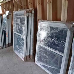 NEW ENERGY HURRICANE WINDOWS AND DOORS