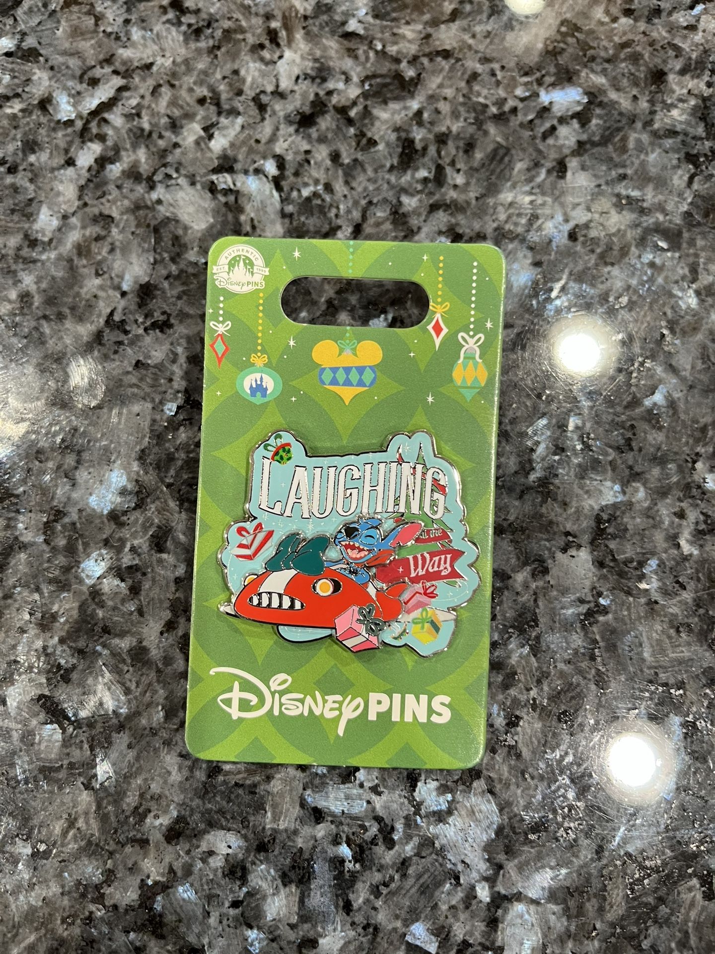 Disney Parks Stitch “Laughing All The Way” Holiday Christmas pin. Brand new on original card. Smoke free home