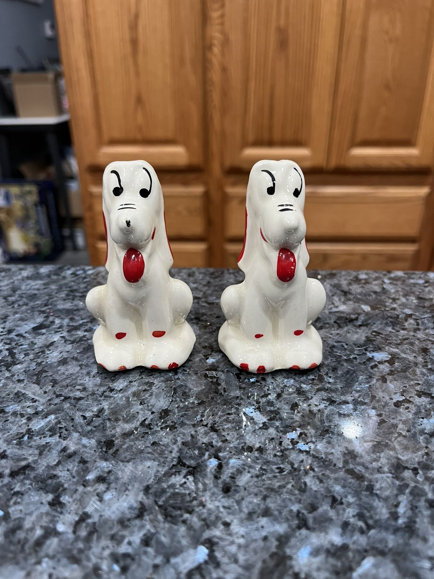 Vintage Ceramic Shawnee 1950’s White Dogs with Red and Black pair of Salt and Pepper shakers. Preowned with original cork stoppers.