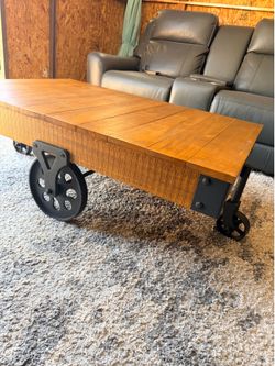 Excellent condition Vintage Industrial Style* *Solid wood and metal wheels *Dimensions* (L47” W31” H16”)