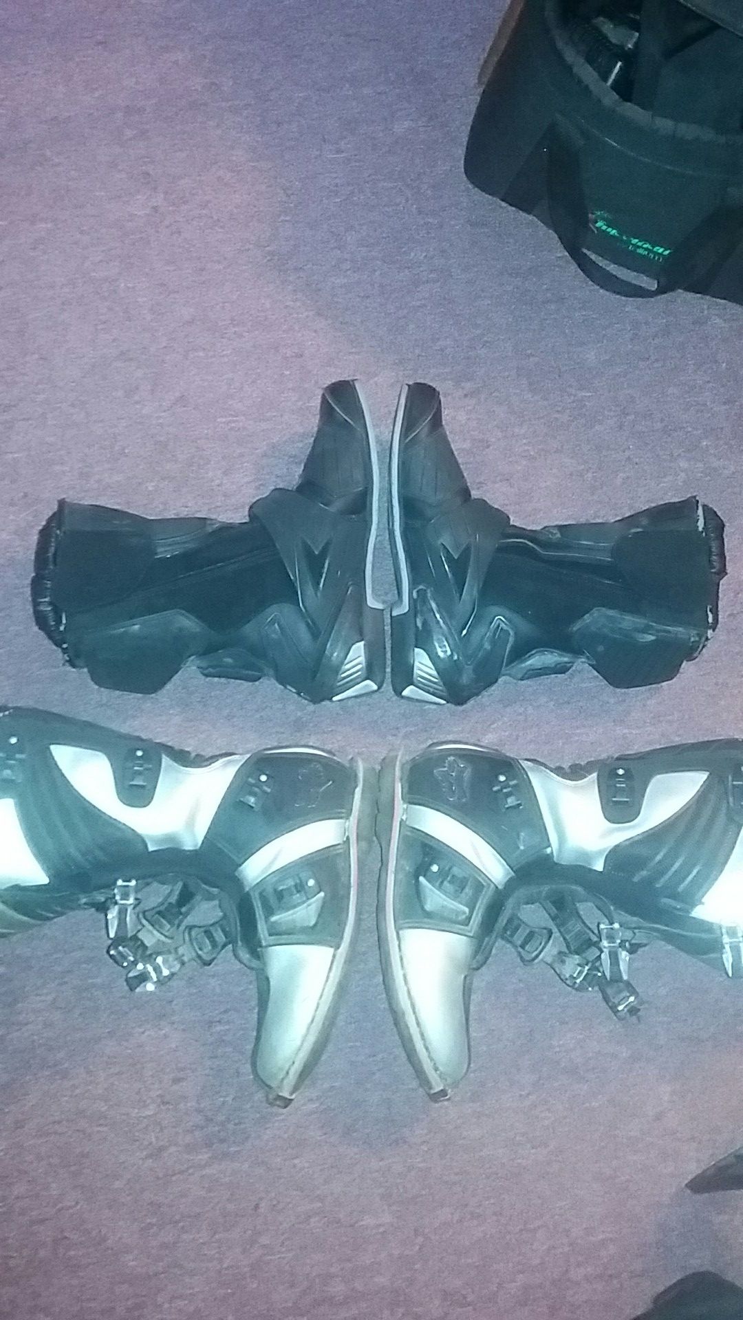 2 different brands of size 12 motocross boots one pair by Fox Racing the other are Joe rocket Brand boots