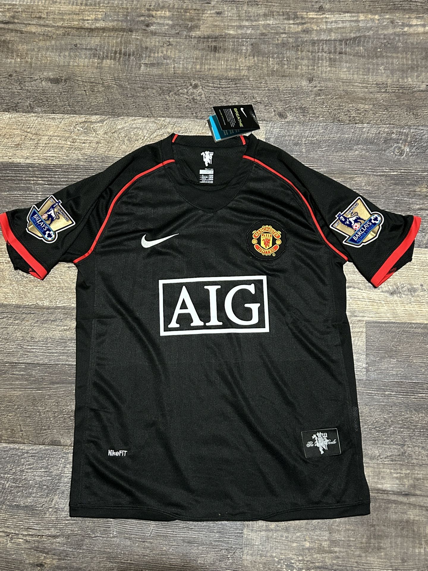 Man United black jersey (Size Adult M)