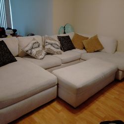 2pc Sectional, Sofa (beige) W/ Storage Ottoman A 133 x86x66 beige 2 PC sectional (it's not heavy) it comes with a 53x25 storage ottoman 

It's a year 